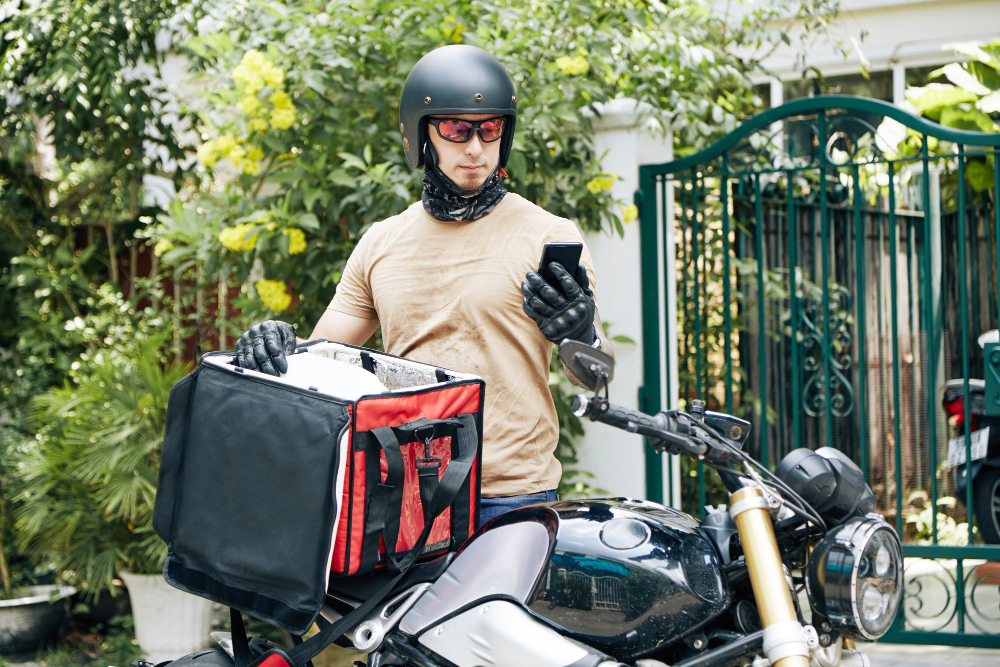 in helmet and protective glasses checking a delivery order